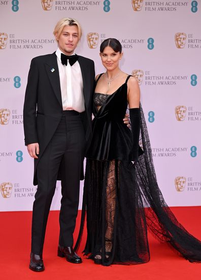 Jake Bongiovi and Millie Bobby Brown attend the EE British Academy Film Awards 2022 at Royal Albert Hall on March 13, 2022 in London, England. 