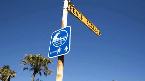 A tsunami evacuation route sign