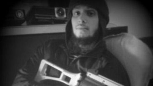 British man Nahin Ahmed holding a toy gun - pre travel to Syria - in an image that was taken from his computer by UK police. Credit: West Midlands Police