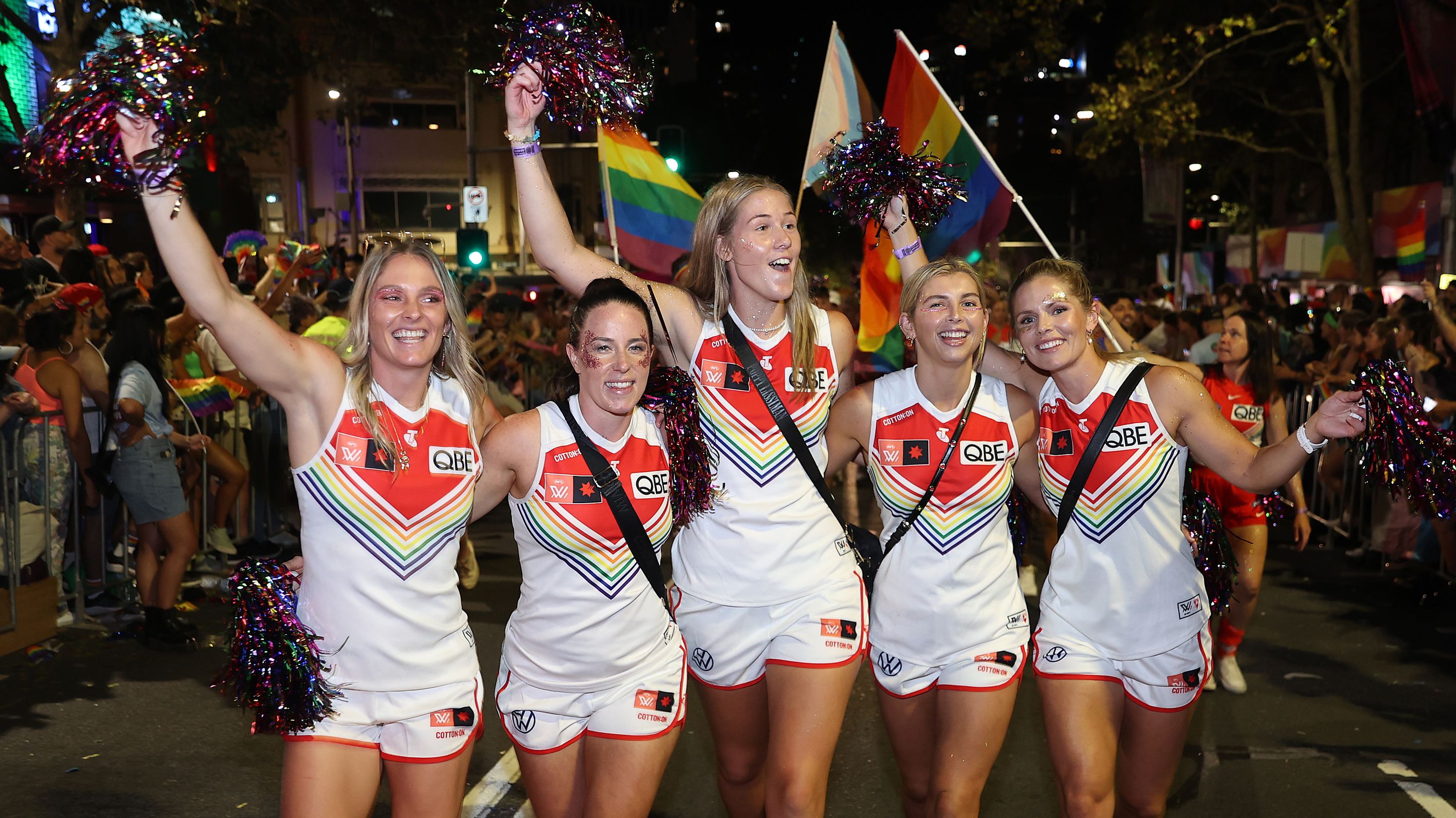 Sydney Swans AFLW players Lisa Steane, Brooke Lochland, Bella Smith, Maddy Collier,  and Alana Woodward walk in the Sydney Gay &amp; Lesbian Mardi Gras Parade.