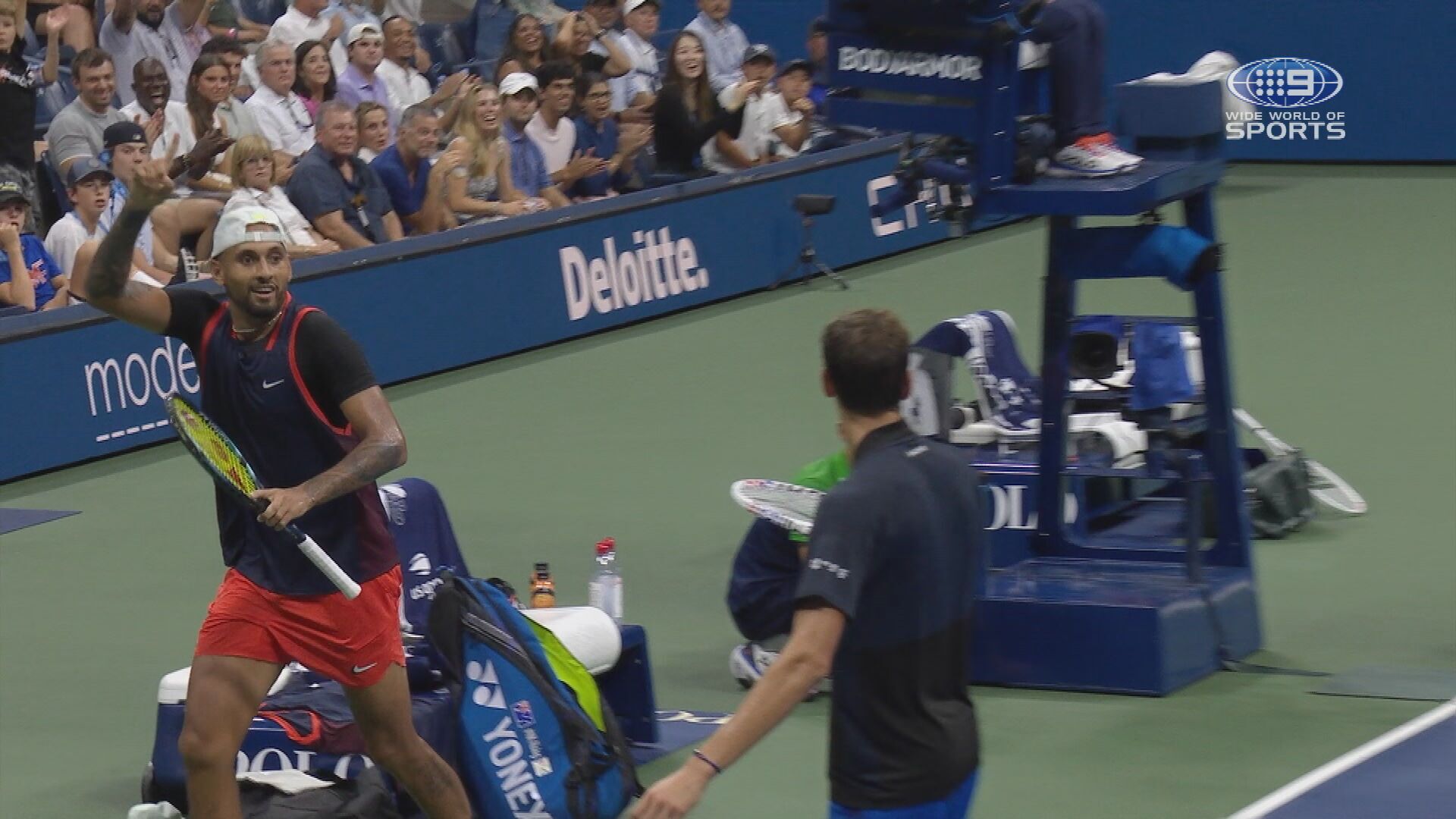 Nick Kyrgios celebrates after &#x27;winning&#x27; a point with a shot that was deemed illegal.