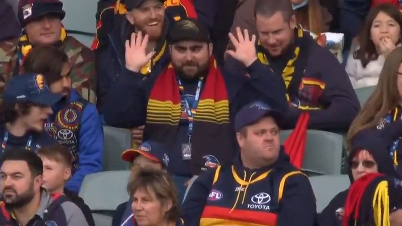 Adelaide Crows fan hilariously refuses to touch ball after Chief Health Officer's advice