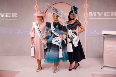 Myer Fashions on the Field Racewear winner Brittney Tamou (centre) poses alongside third runner up Emma Scodellaro and second runner up Olivia Moor.