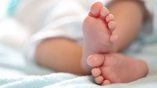 Stock image, baby feet.