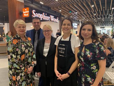 Jo Abi pictured with Rachel Golding (wearing an apron) from Dinner on the Table.