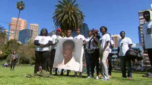 A memorial walk in Melbourne's CBD was attended by dozens of people today. 