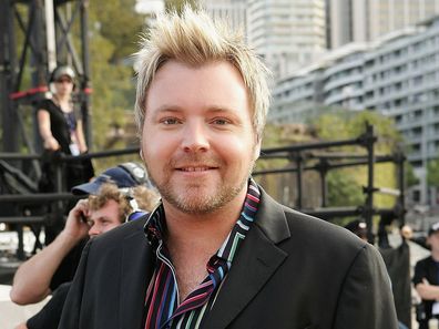 Kyle Sandilands arrives for the finale of the 2005 Australian Idol at the Sydney Opera House on November 21, 2005 in Sydney, Australia.  