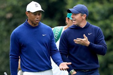 Tiger Woods (left) and Rory McIlroy.