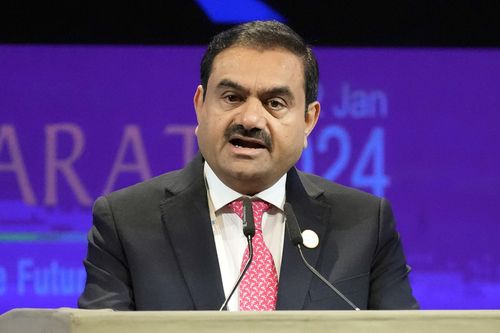 FILE - India's Adani Group Chairman Gautam Adani addresses the colorful Gujarat Global Summit in Gandhinagar, India, January 10, 2024. (AP Photo/Ajit Solanki, File)