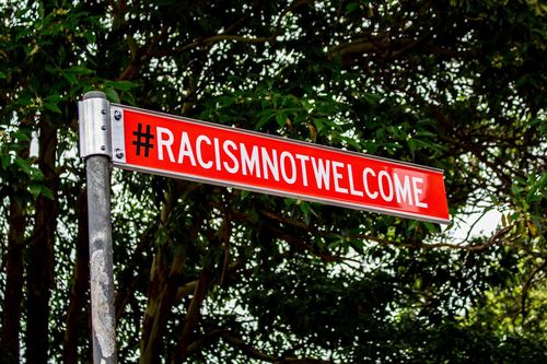 Mï»¿onths after dozens of incidents of racist graffiti across Sydney's Inner West, the local council and community have responded with a signpost declaring that "racism is not welcome".