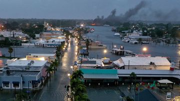 Floodwater innundates downtown Tarpon Springs, Florida, on the morning of August 30.