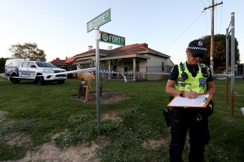 A man has spent the night in custody as police investigate the discovery of five bodies in a Perth home.