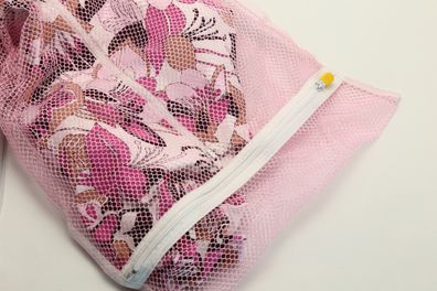 Nets laundry bag, for washing clothes in washing machine on white background