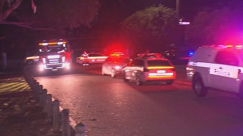A 28-year police officer is fighting for his life in Perth after police say he was run over and dragged almost 20 metres while performing an arrest.