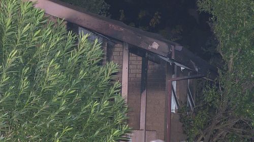 Windows cracked in the heat of the blaze causing "loud noises" to ring out across the street.