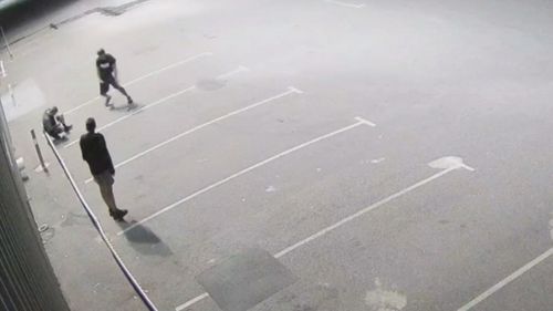 The cleaner was on a break, sitting in a carpark outside his work when two men approached him and beat him with a rock.