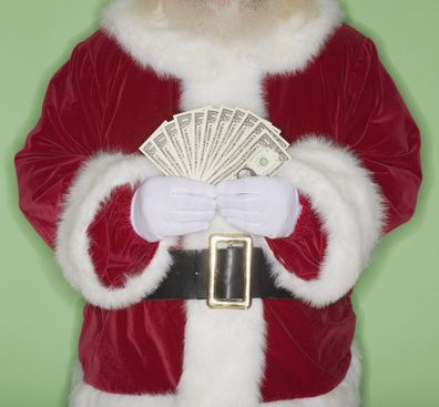 Santa holding money