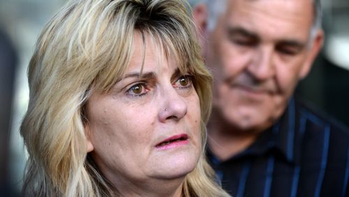 Sharon Thomlinson reacts outside the Supreme Court in Brisbane in 2013. 