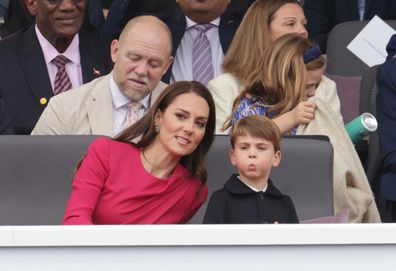 (L-R 2nd row) Mike Tindall, Victoria Starmer, Mia Tindall, (front row) Catherine, Duchess of Cambridge, and Prince Louis of Cambridge wait ahead of the Platinum Pageant on June 05, 2022 in London, England.
