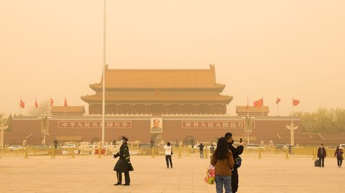 Tiananmen Square, shrouded in sandstorms in Beijing, China. 