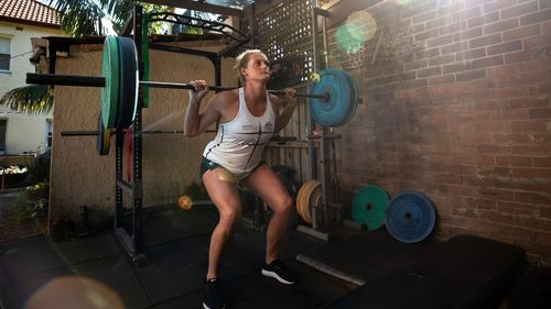 Australian rower Georgie Rowe trains in isolation in a backyard gym in Sydney, Australia. 