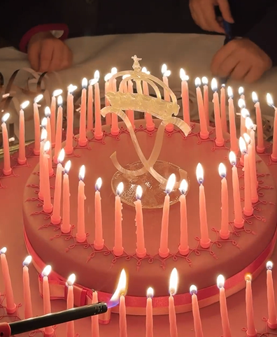 Queen Silvia's birthday cake featured a royal emblem and 80 candles.