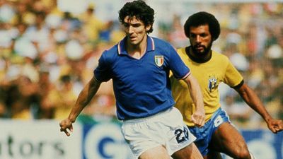 Paolo Rossi of Italy competes for the ball with Leovegildo Lins da Gama Júnior of Brazil during the World Cup Spain 1982 match between Italy and Brazil at Estadio de Sarrià on June 5, 1982 in Barcelona , Spain.