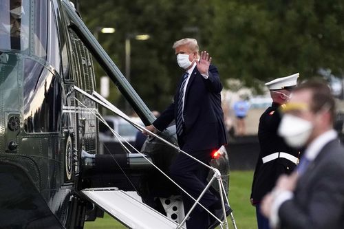 President Donald Trump boards Marine One to return to the White House 