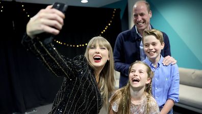 Taylor Swift takes a selfie with Prince William, Prince George and Princess Charlotte at Wembley Stadium, London