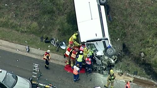 Three injured after semi-trailer ploughs into oncoming traffic on Sydney freeway