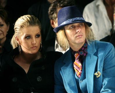Lisa Marie Presley and her husband, Michael Lockwood, watch the Anna Sui 2008 spring/summer show at Fashion Week in New York, Sept. 10, 2007