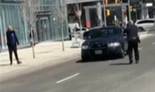 The suspect tries to threaten the officer. (CTV News)