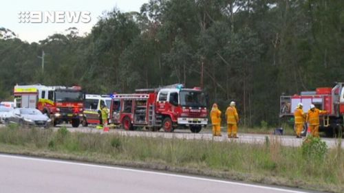 Part of the highway was closed as emergency vehicles attended the scene. (9NEWS)