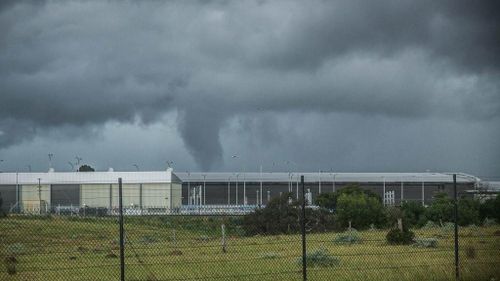A funnel cloud was sighted at Tullamarine at around 1.50pm. (Twitter, @synoptica)