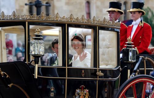 The bride and groom travelled by carriage from the chapel along Windsor High Street and the Long Walk