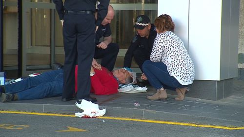 A Salvation Army volunteer fell and hit his head, prompting a rush of responders.