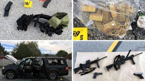 Weapons and ammunition carried by suspects involved in a mass shooting, at the scene of a shooting with an officer, in San Bernardino, California. (AAP)