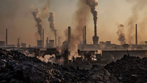 Smoke billows from a large steel plant in Inner Mongolia, China.