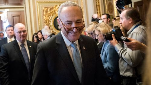 Senate Minority Leader Chuck Schumer (D-NY) leaves a meeting with Senate Democrats on Capitol Hill.