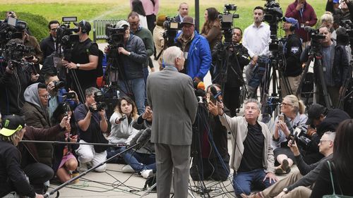 Attorney Mark Geragos, representing Erik and Lyle Menendez, speaks to the media as he arrives for a hearing in their case Thursday, April 17, 2025, in Los Angeles. (AP Photo/Damian Dovarganes)