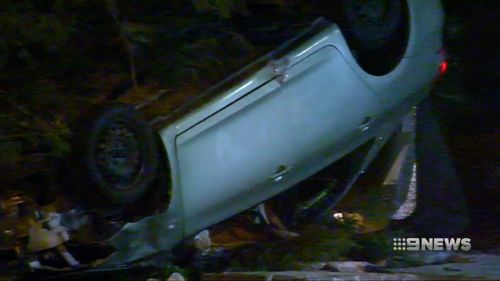 The Yaris driver escaped the crushed and flipped car and fled the scene without checking on Ms Paterson. (9NEWS)