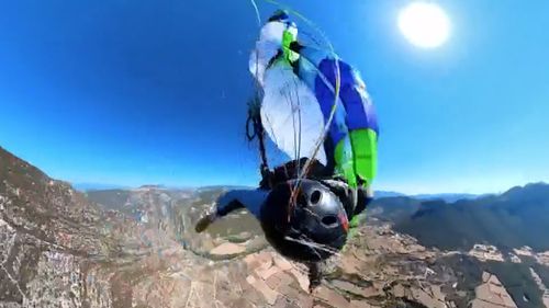 An acro paraglider in Spain says he came just a second from death after his break line got stuck.