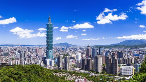 Taipei, Taiwan- July 20, 2012: Amazing view of Taipei from top of the mountain, Taiwan. Skyscrapers and other modern buildings of downtown. Scenic Taipei skyline. Amazing cityscape. Taiwan is a popular tourist destination in Asia.
