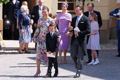 STOCKHOLM, SWEDEN - JUNE 13: Crown Princess Victoria of Sweden, Prince Oscar of Sweden and Prince Daniel of Sweden leave after the christening of Princess Ines of Sweden at the Drottningholm Palace Chapel on June 13, 2025 in Stockholm, Sweden.  (Photo by Michael Campanella/Getty Images)