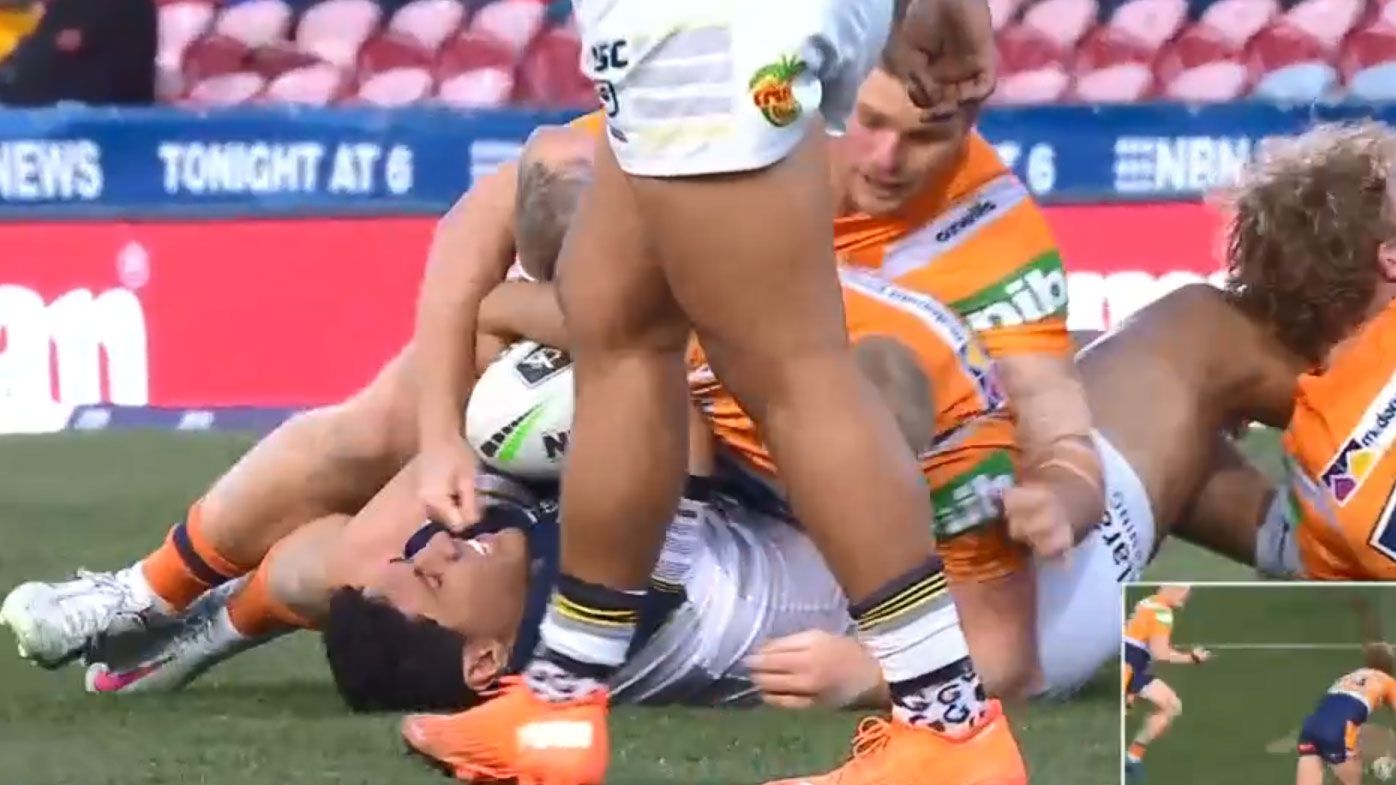 Taumalolo goes down in heavy tackle. (Nine)