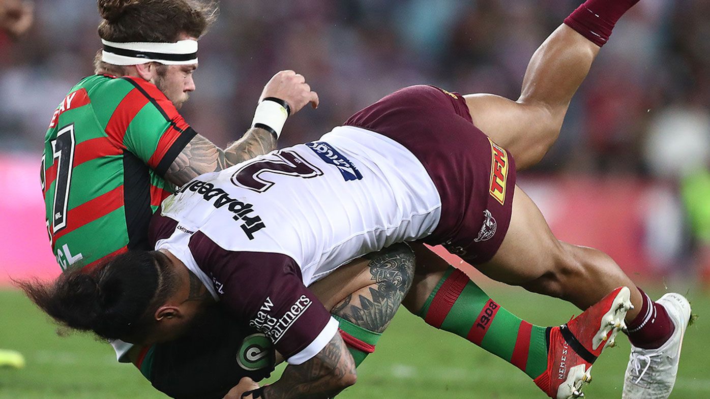 Ethan Lowe is hammered by Jorge Taufua during Souths Sydney's semi final win over Manly.