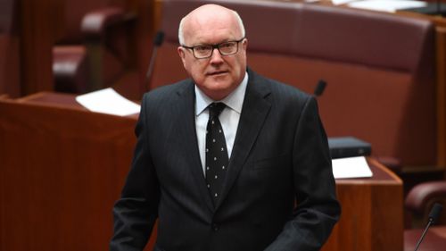 Calls for George Brandis to resign amid accusations he misled parliament