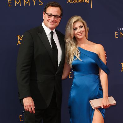 Bob Saget and Kelly Rizzo attend the 2018 Creative Arts Emmy Awards at Microsoft Theater on September 8, 2018 in Los Angeles, California. 