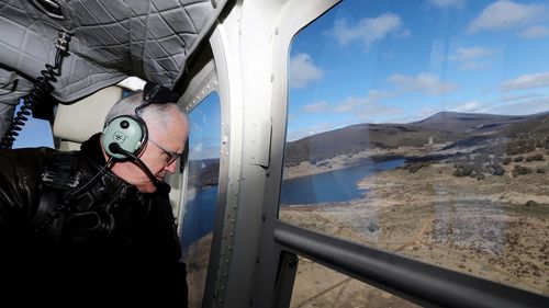 Mr Turnbull during an aerial tour of the Cooma region via helicopter after visiting the Snowy Mountains to provide an update of the project in August last year. (AAP)