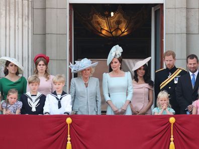 Princess Eugenie, Princess Beatrice, Camilla, Duchess of Cornwall, Catherine, Duchess of Cambridge, Meghan, Duchess of Sussex, Prince Harry, Duke of Sussex, Peter Phillips, Autumn Phillips, Isla Phillips and Savannah Phillips on the palace balcony of Buckingham during The Color Parade on June 9, 2018 in London, England. 